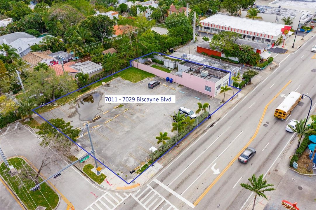 Potential development site up to 3 stories (35') on Biscayne Blvd in MIMO District.  Includes 4-folio #'s on which is the featured pink building with a short-term tenant.  Covered land play.
