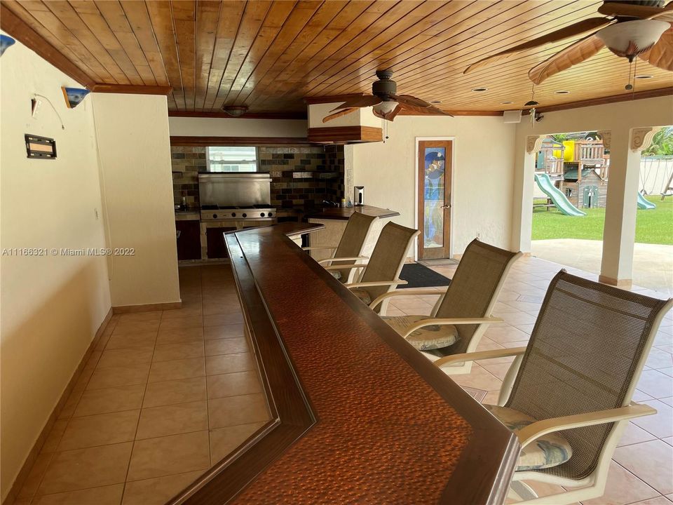 Outside terrace with kitchen.