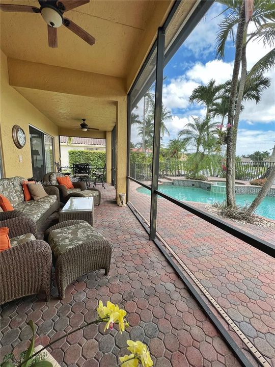 Patio - Screened sitting area with ceiling fans and lighting