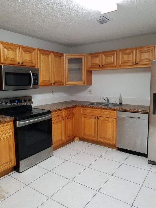 Kitchen with granite counter top