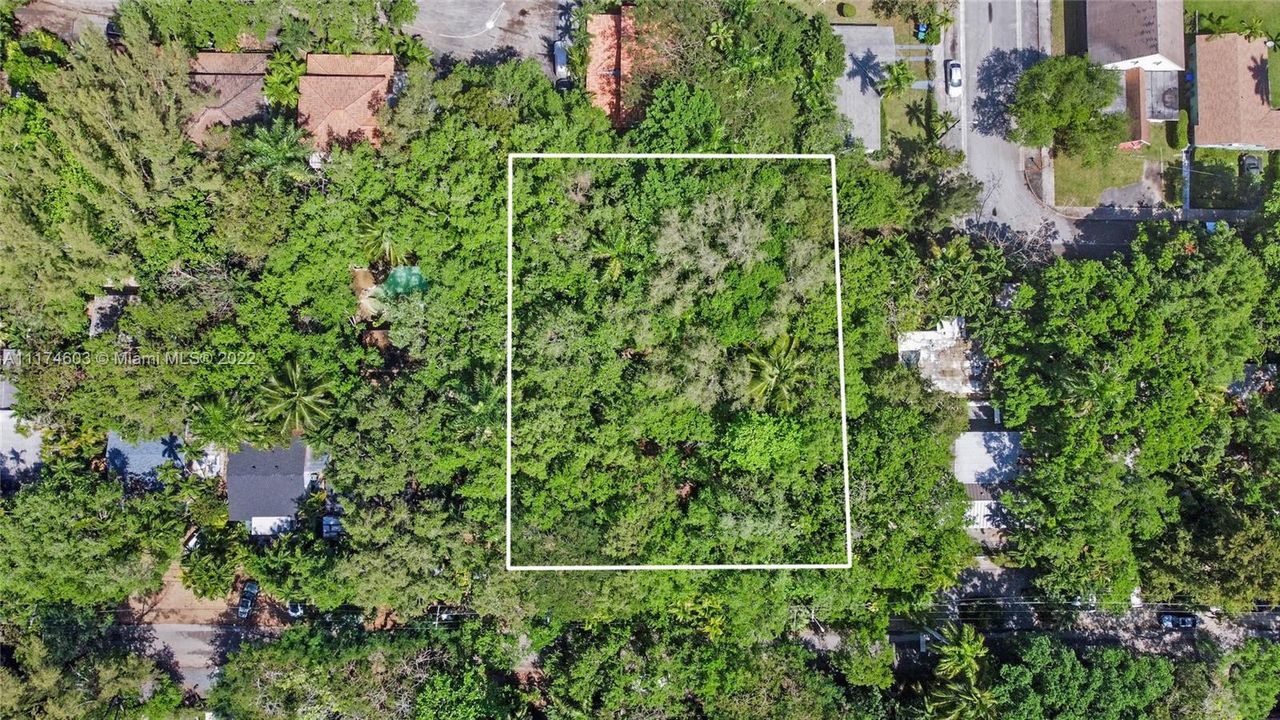 Aerial view of property. Deep lot perfect to build out, big trees on sides of property
