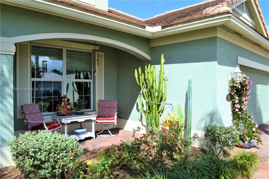 Front porch is south facing. neighborhood has sidewalks allowing neighbors to become acquainted, "set a spell over iced tea or Mint Juleps".