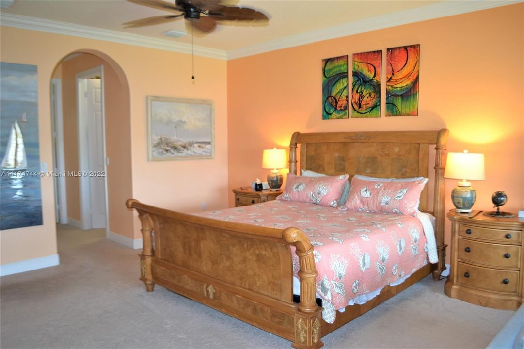 Master suite spacious with a luxury retreat feel overlooking the lake.