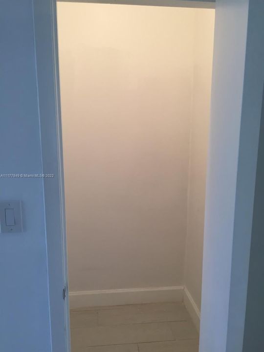 Spacious closet in living room area