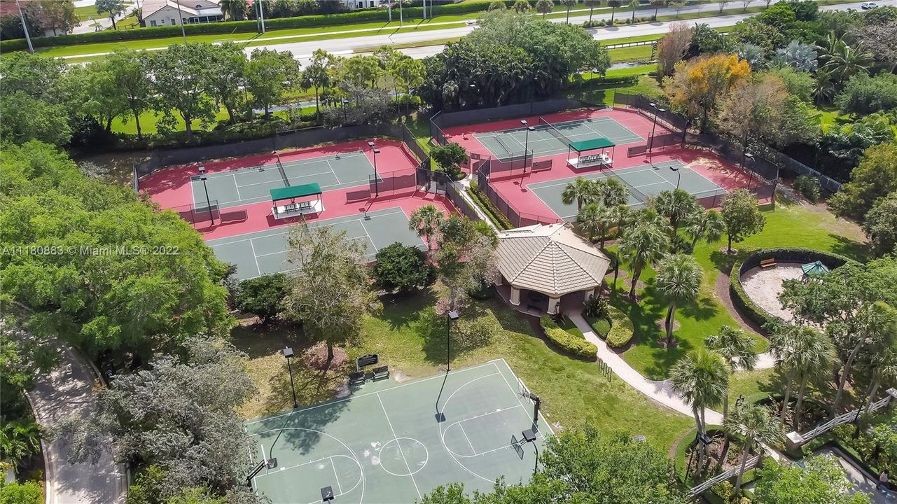 Overhead view of the 4 Tennis Courts, Basketball Court, and Tot Lot!