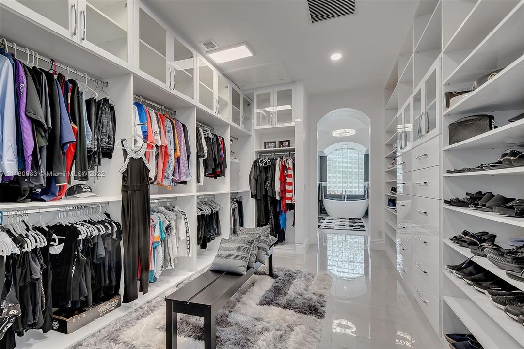 Custom Open Closets with Plenty of Built in Storage!