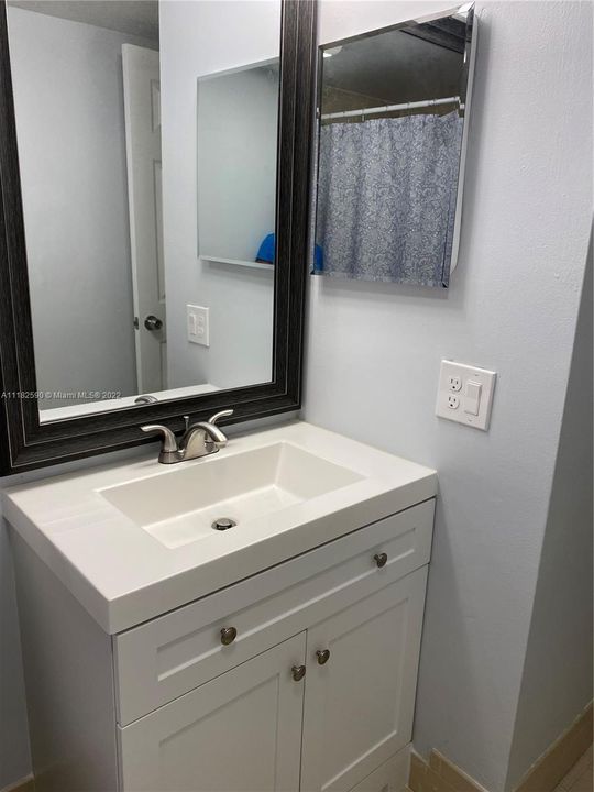 Brand new guest bathroom vanity & mirror