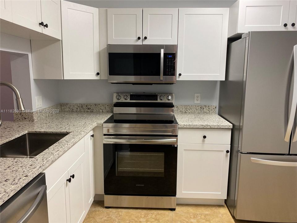 Brand new kitchen cabinetry and granite countertops