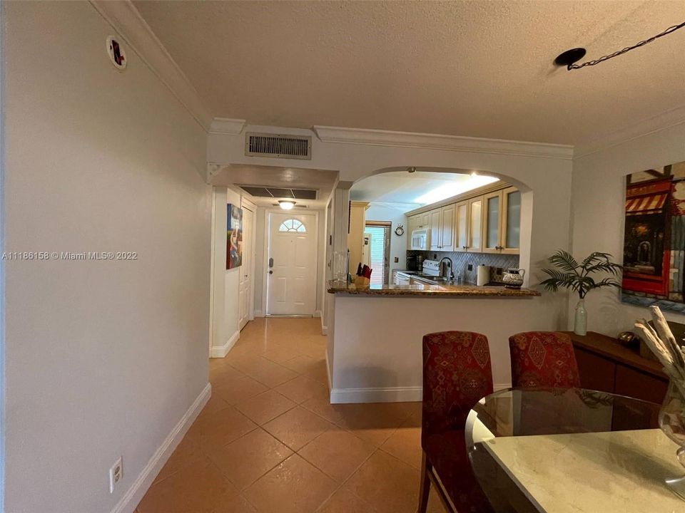 View of the Kitchen and Foyer from the Dining Room