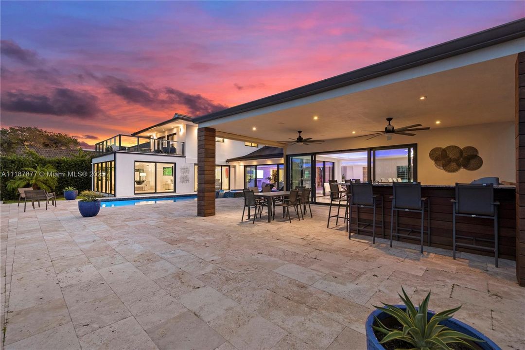 Warm stone terrace wrapped in color