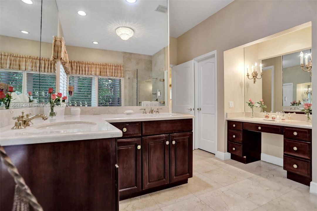 principal bathroom: sconces on right mirror are excluded; see seller disclosures