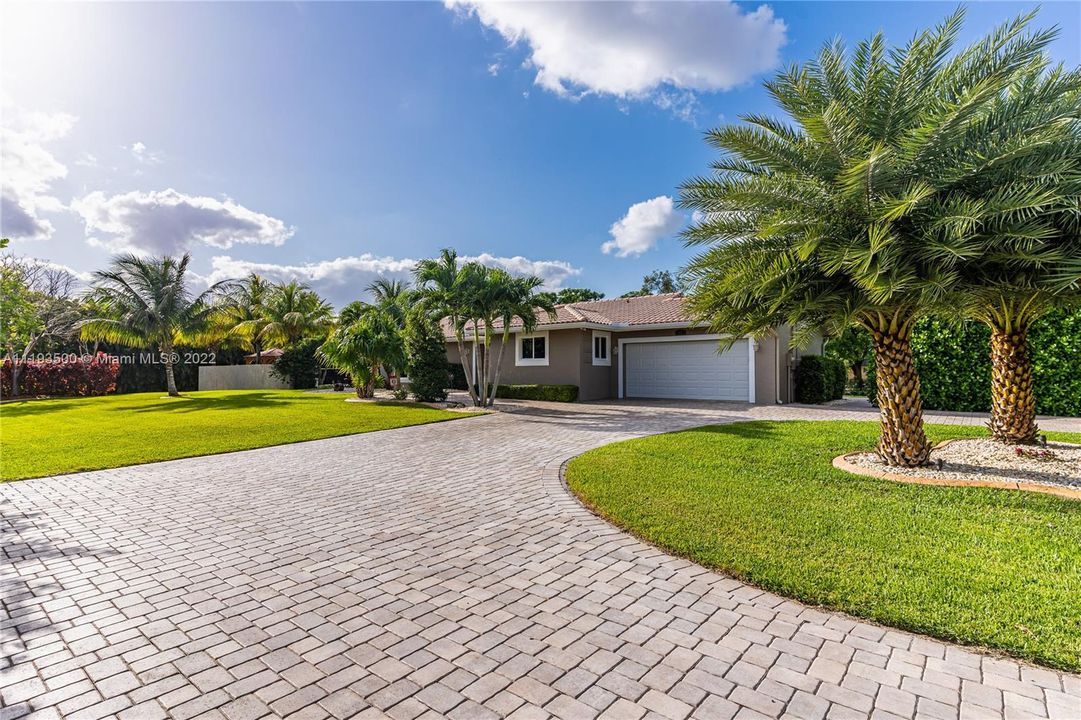Beautiful paved circular driveway/room for lots of vehicles.