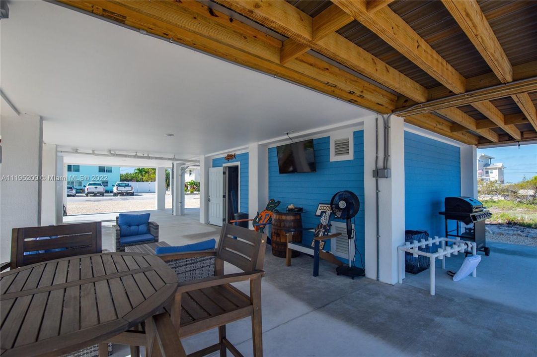 Downstairs sitting area/carport