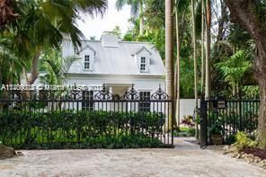 Prettiest fence in Coconut Grove. Blocks from the Village.