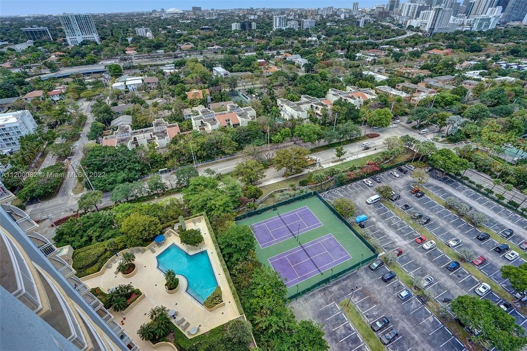 VIEWS OF POOL & TENNIS COURTS FROM BALCONY