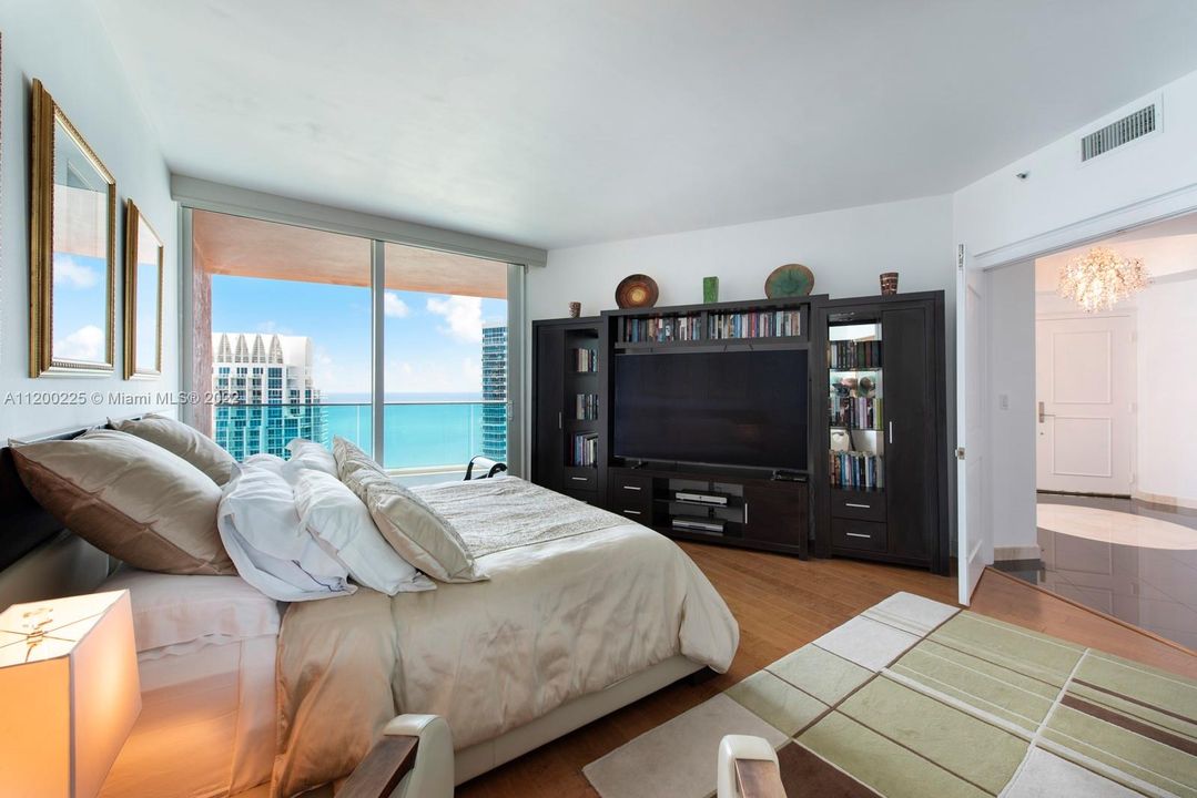 master bedroom with access to ocean side balcony