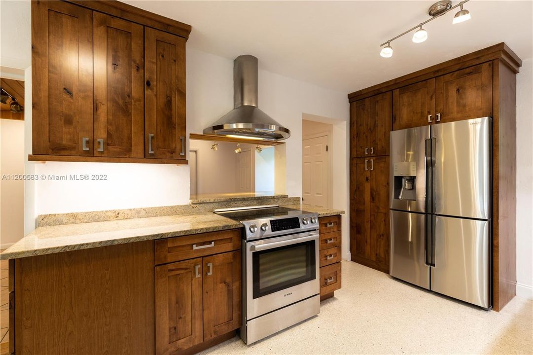 Wood Cabinets/Stainless Steel