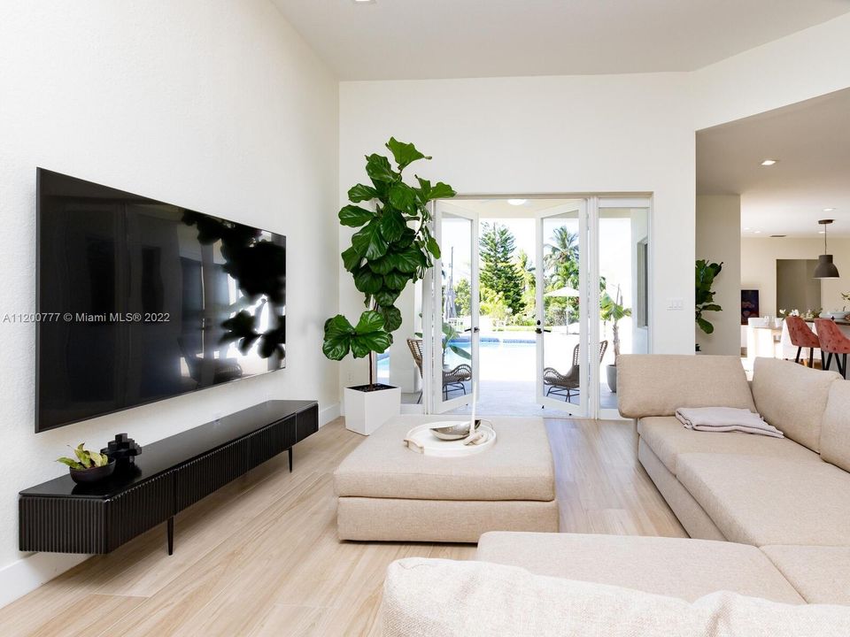 Living Room Opens To Dining Room, Kitchen and Family Room