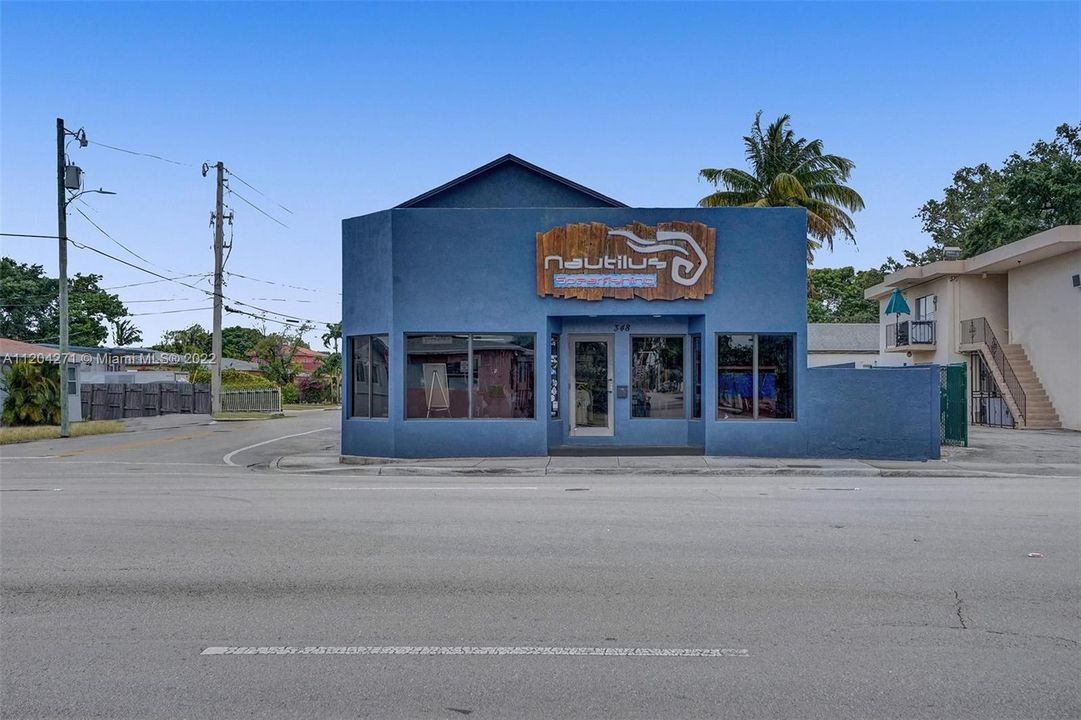 corner lot,  free-standing building, AND established, successful, income-producing business