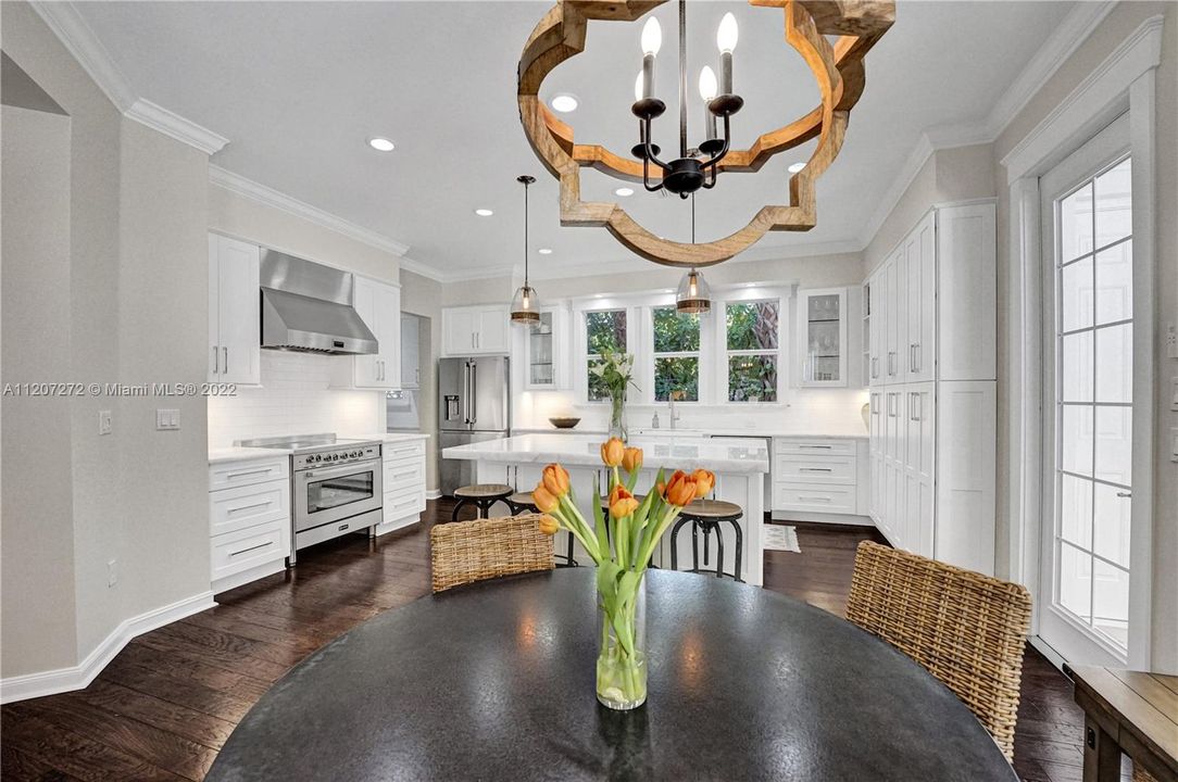 Kitchen / Breakfast Area/ Door To Patio & Pool Area