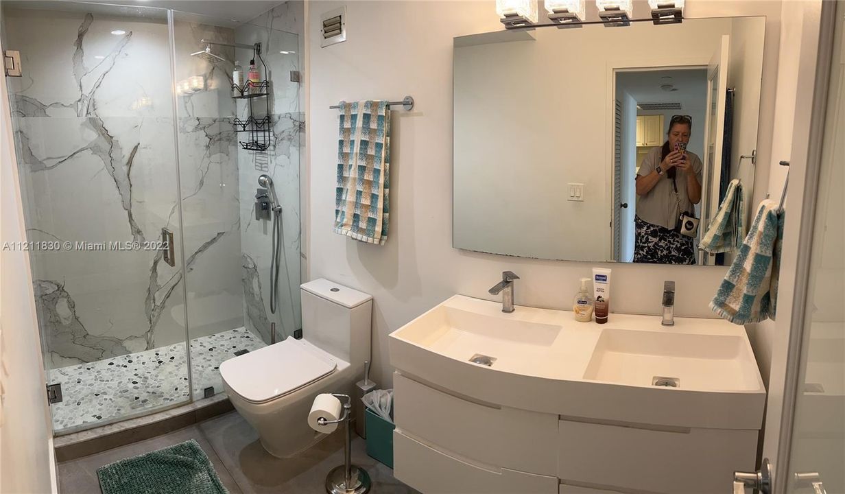 renovated bathroom with dual sink