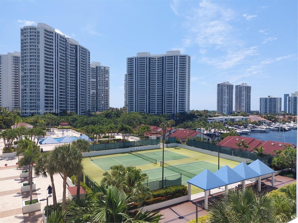 TENNIS COURTS, LINAI DECK POOL, JACUZZI- VIEW FROM BALCONY