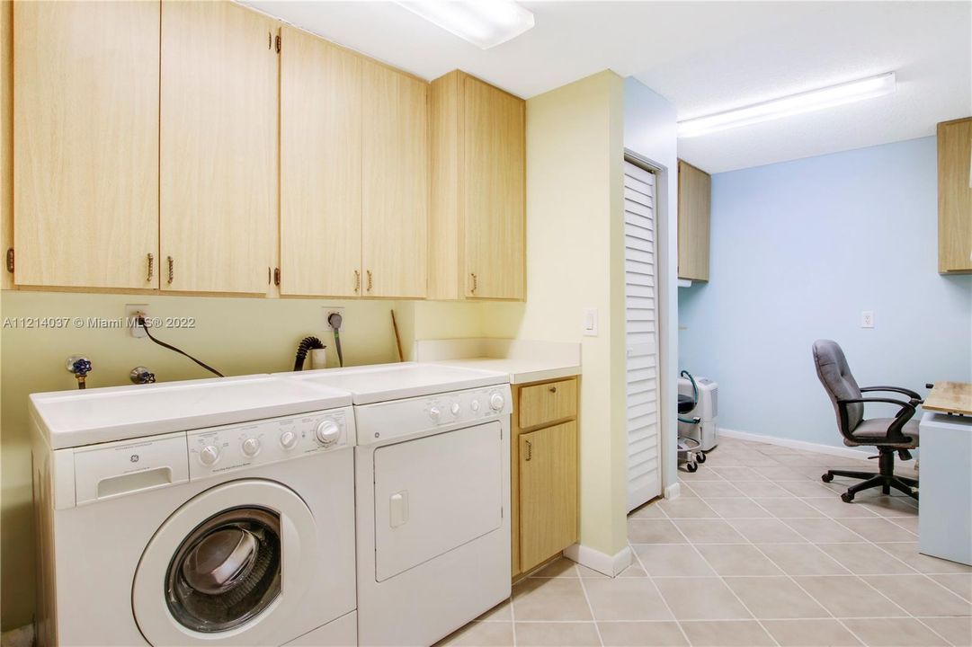 Laundry Room and attached spacious area that can be used as den/BDRM/storage room
