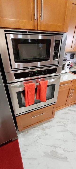 Kitchen: built-in s/s microwave and oven