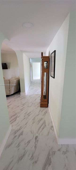 Hallway to family room, bedrooms and 2nd floor master suite
