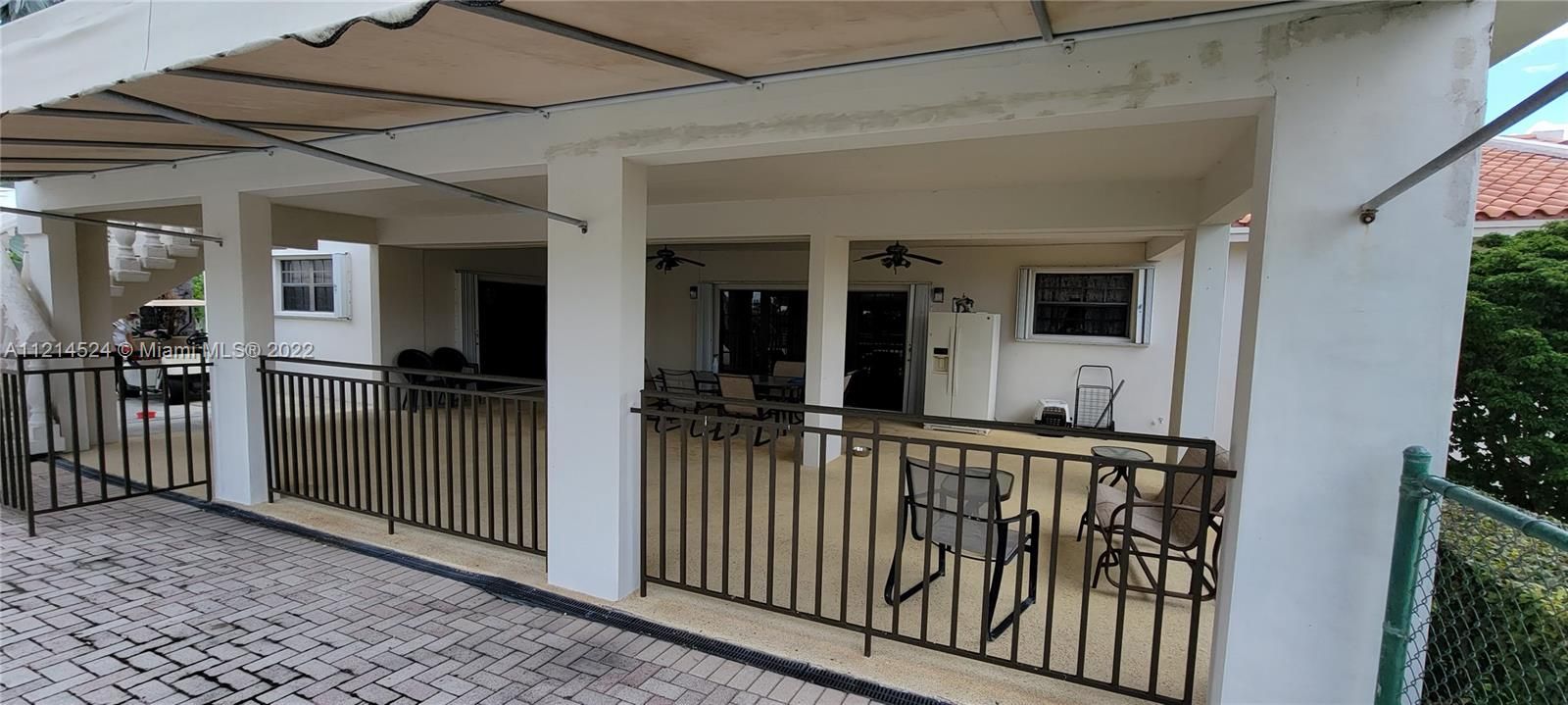 Huge covered patio with entry/exit to residence