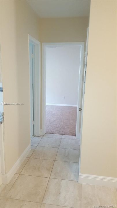 HALLWAY TO 2ND BEDROOM, BATH AND WALK IN CLOSET