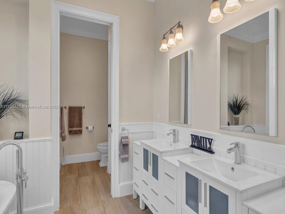 Master bath has separate step in shower, private WC, dual sinks and free-standing soaking tub of the highest quality and design. Combined with  glorious views of the lake what more could you ask ?