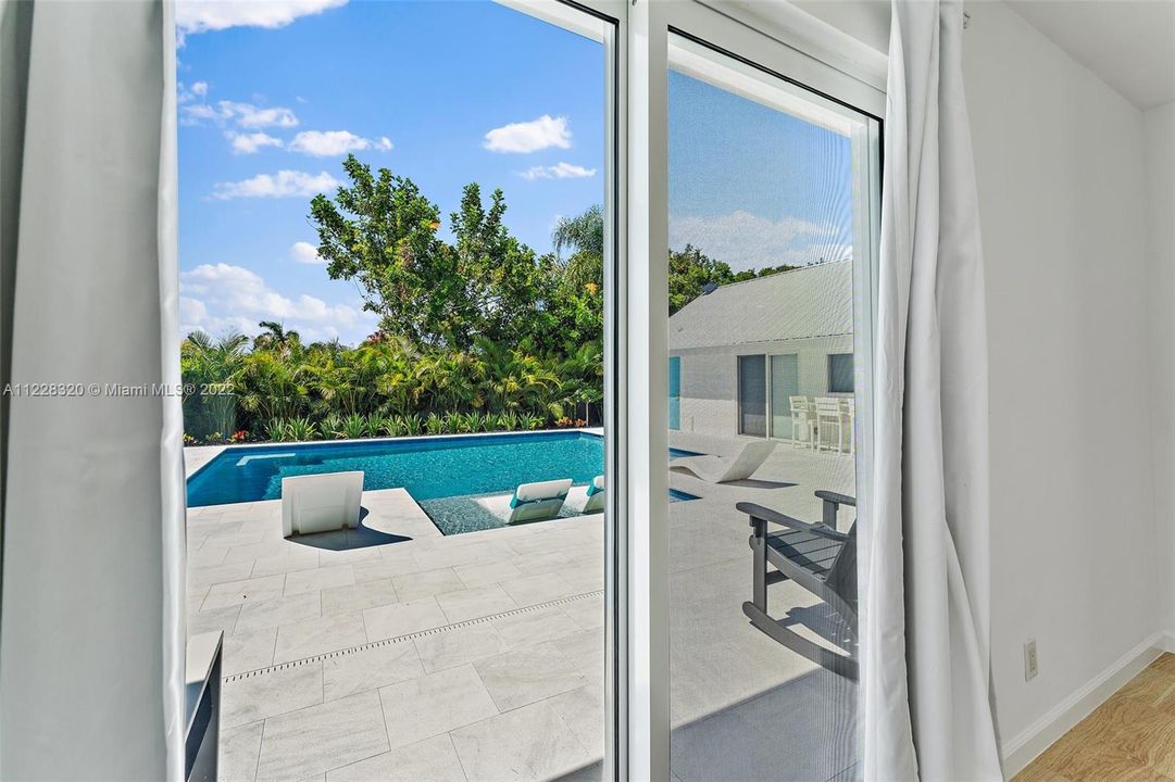 Grand Bedroom Overlooking Pool