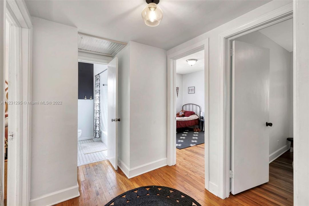 Hallway Entrance to Bed and Baths