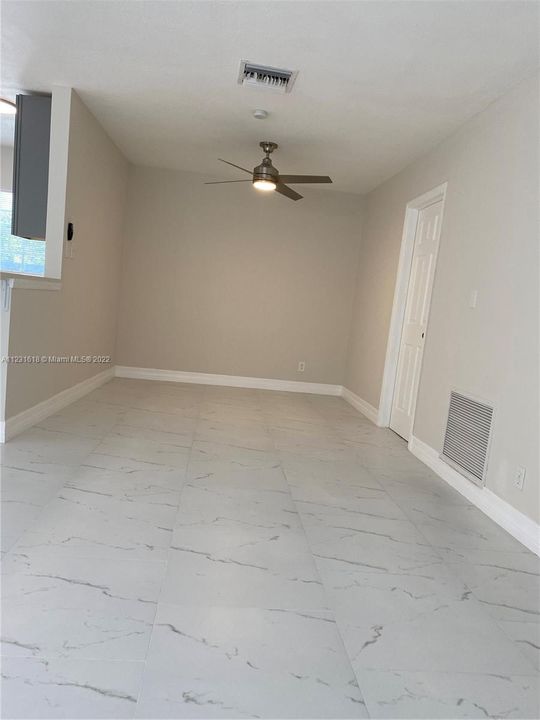 FAMILY/LIVING AREA ALL FRESHLY PAINTED WITH NEW LIGHTING AND FIXTURES.