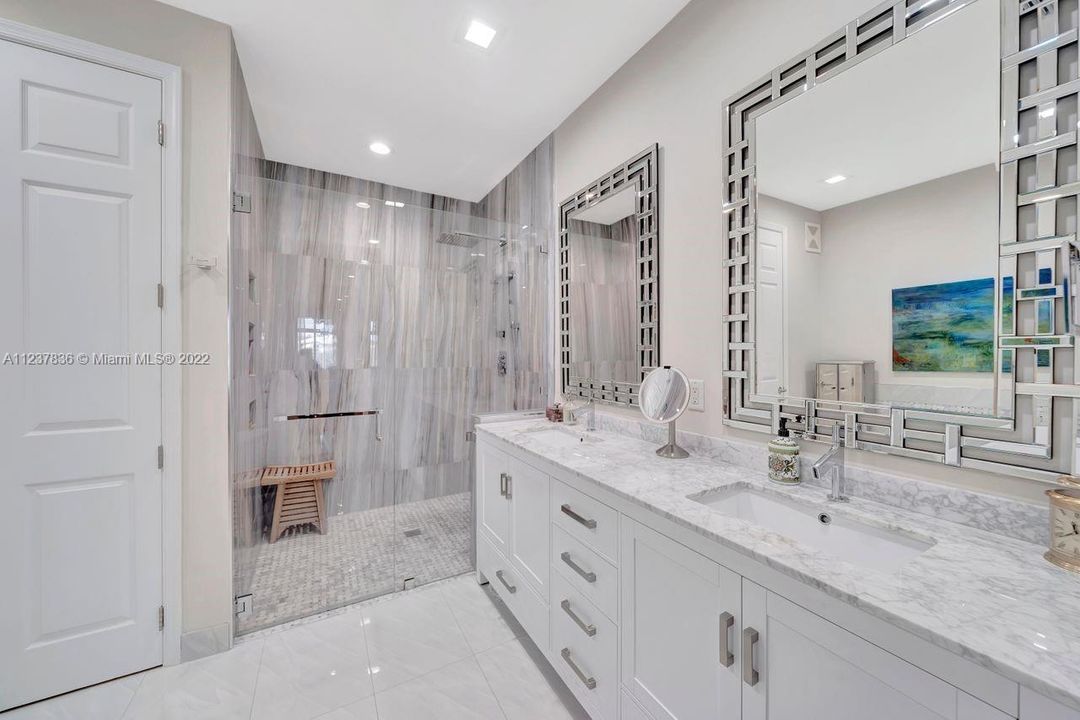 Master bathroom with dual sinks, marble countertops and elegant finishes.  Just bring your toothbrush.