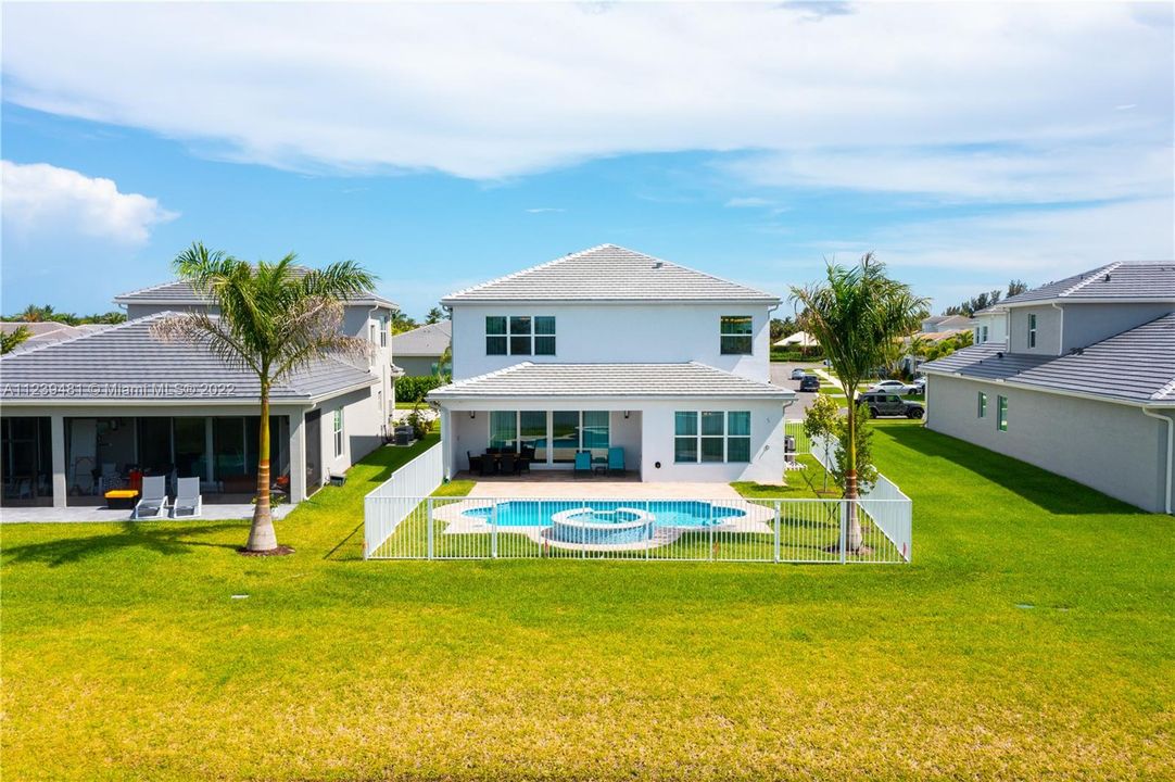 Aerial View | Backyard | Fenced-in & Covered Patio | Lake view