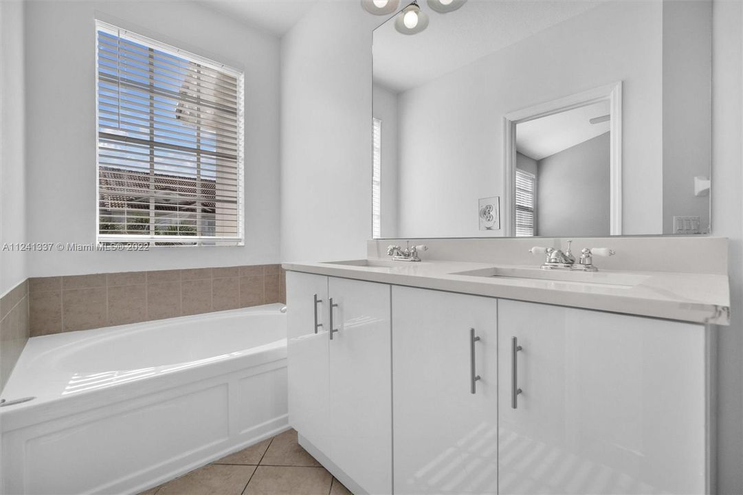 Main bathroom has separate tub/ shower. Double sink.