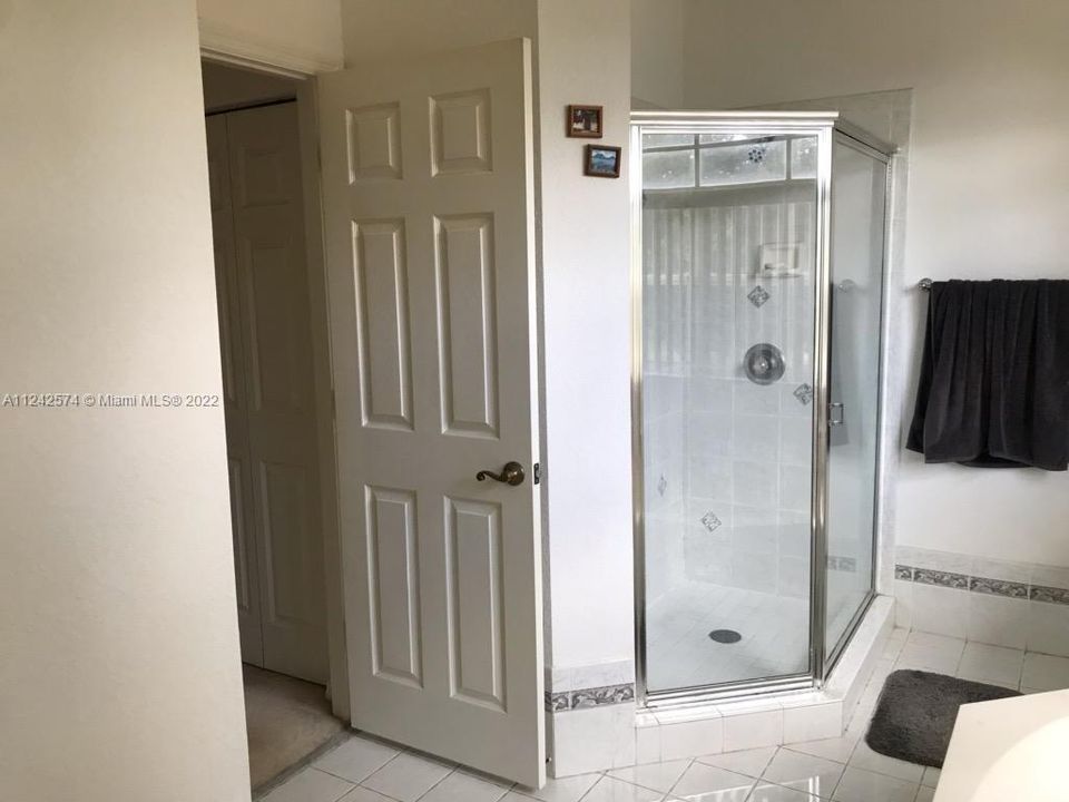 Here is the separate showerand in the hallway are 2 closets, 1 on each side of the hallway.