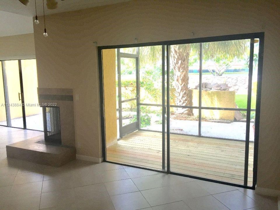 Enclosed & open patio. Fireplace