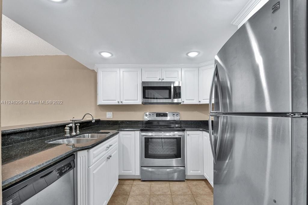 Updated Kitchen With Granite Counter Tops