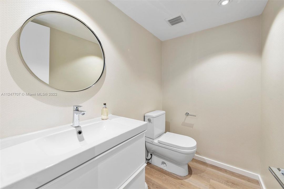 Powder Bathroom w/ new Vanity, Toilet & Flooring