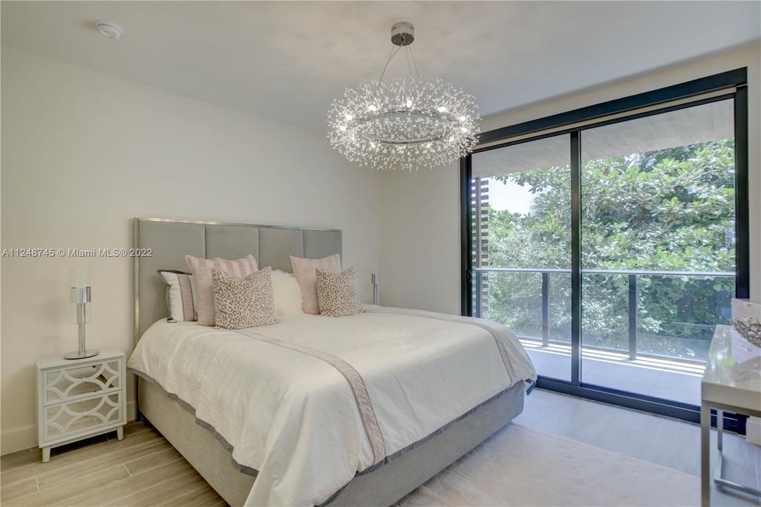 Primary Bedroom with adjacent balcony