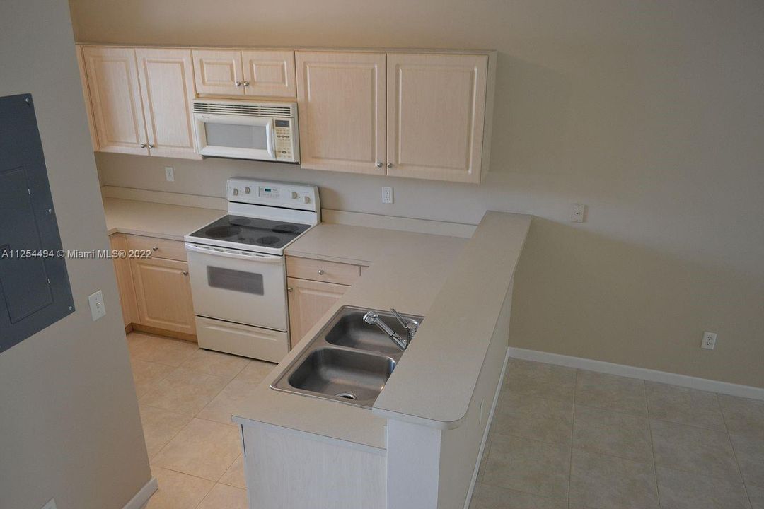 Kitchen open view with the living and dining room