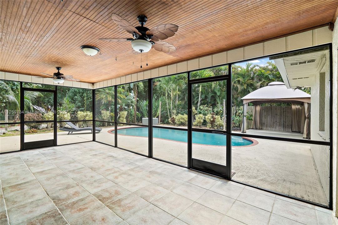 Screened in lanai. Pool area. * Note -There is no gazebo anymore.