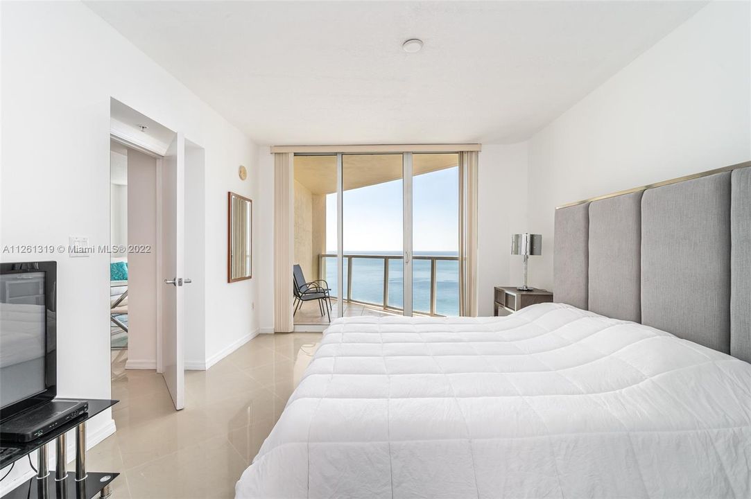 Master bedroom - private balcony, ocean views, 2 walk in closets.