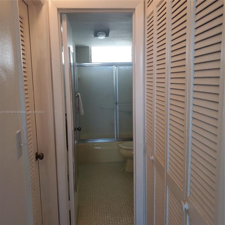 HALL WAY TO BATHROOM WITH EXTRA STORAGE CLOSET 2903 POINT EAST DR #K509