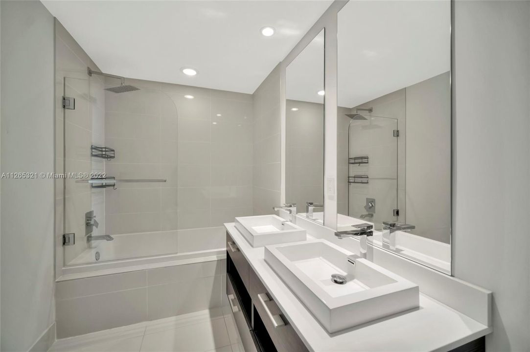 Master Bathroom with Double Sinks, Shower and Tub.
