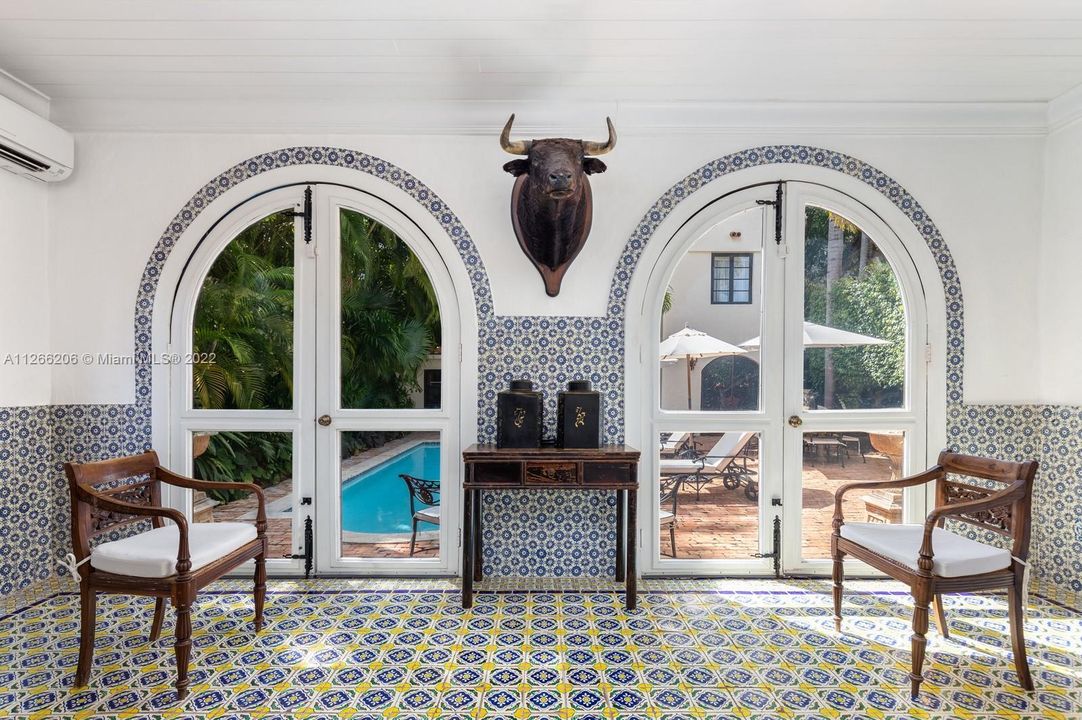 Moroccan themed Florida room over looking pool