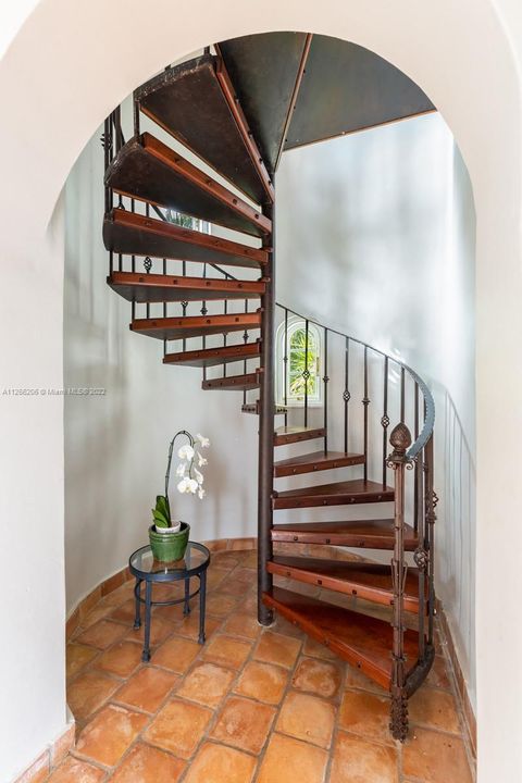 GUEST HOUSE Artisan designed and built spiral staircase